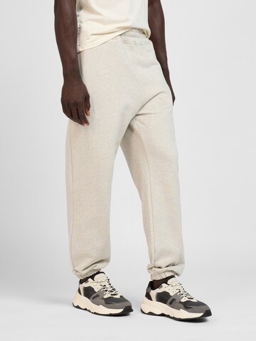 WOTEGA Loose fit Workout Pants 'VibeJog' in Beige: front