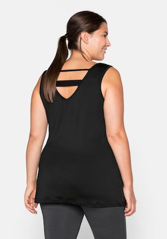 SHEEGO - Top deportivo en negro