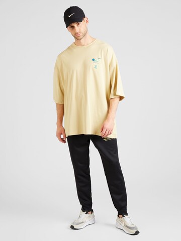 Nike Sportswear Дънки Tapered Leg Панталон в черно