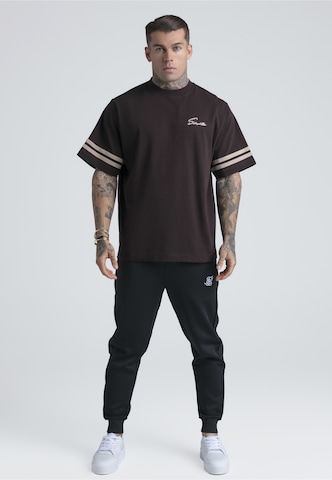 SikSilk - Camiseta 'Script' en marrón