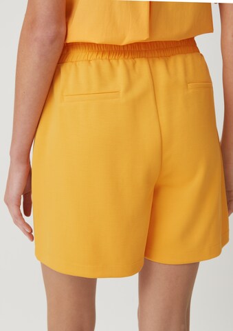 comma casual identity - Loosefit Calças em amarelo