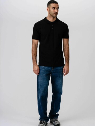 Coupe regular Chemise ' Muscle Polo ' TEESHOPPEN en noir