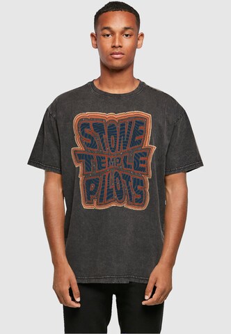 Merchcode T-Shirt 'Stone Temple Pilots' in Schwarz: predná strana