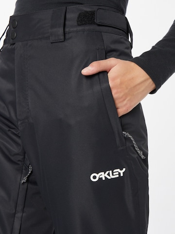 OAKLEY - Loosefit Pantalón de montaña 'Jasmine' en negro