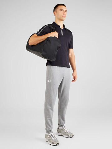 Tapered Pantaloni sportivi 'Rival' di UNDER ARMOUR in grigio