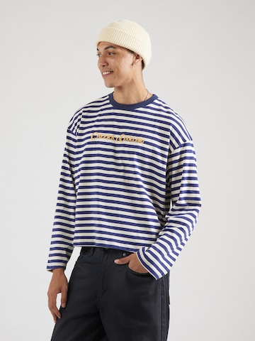 Tricou 'CHEERS, DARLING' de la Kaotiko pe albastru: față