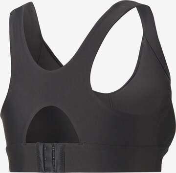 PUMA Bustier Sport bh in Zwart