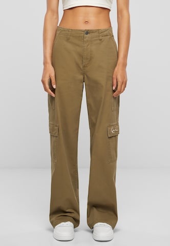 Karl Kani Wide leg Cargo Pants in Green: front