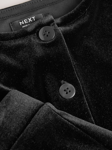 Set de la Next pe negru