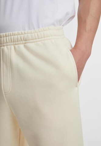 Loosefit Pantaloni di Urban Classics in beige