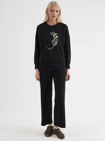 Tuta da jogging di Hiccup in nero: frontale