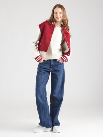 Tommy Jeans Bluzka sportowa w kolorze beżowy