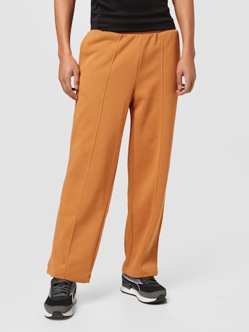 PUMA Loose fit Pants in Brown: front