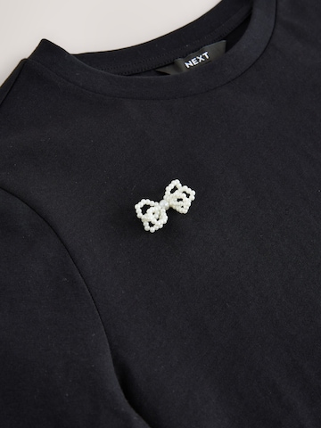 Next T-shirt i svart