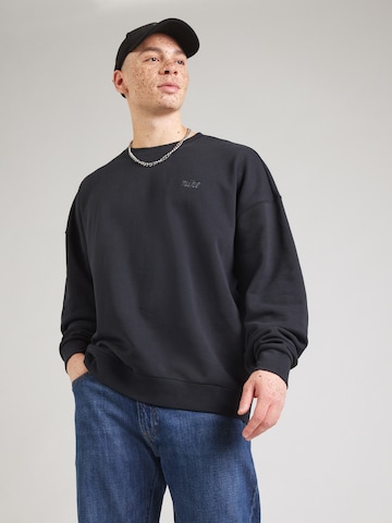 Nike Sportswear Tréning póló 'CLUB' - fekete: elől