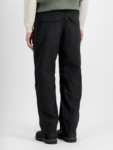 ALPHA INDUSTRIES Loose fit Cargo trousers 'CWU-18/P' in Black: back