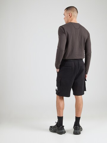 Champion Authentic Athletic Apparel Regular Gargohousut värissä musta