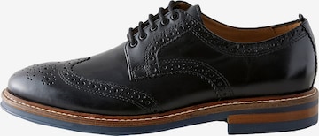 Next Knytsko i svart: framsida