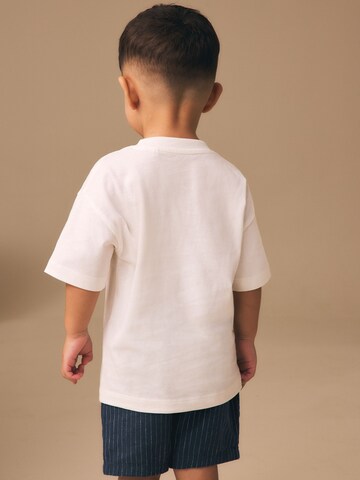 T-Shirt Next en blanc