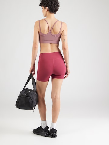 UNDER ARMOUR - Skinny Pantalón deportivo 'Motion' en rojo