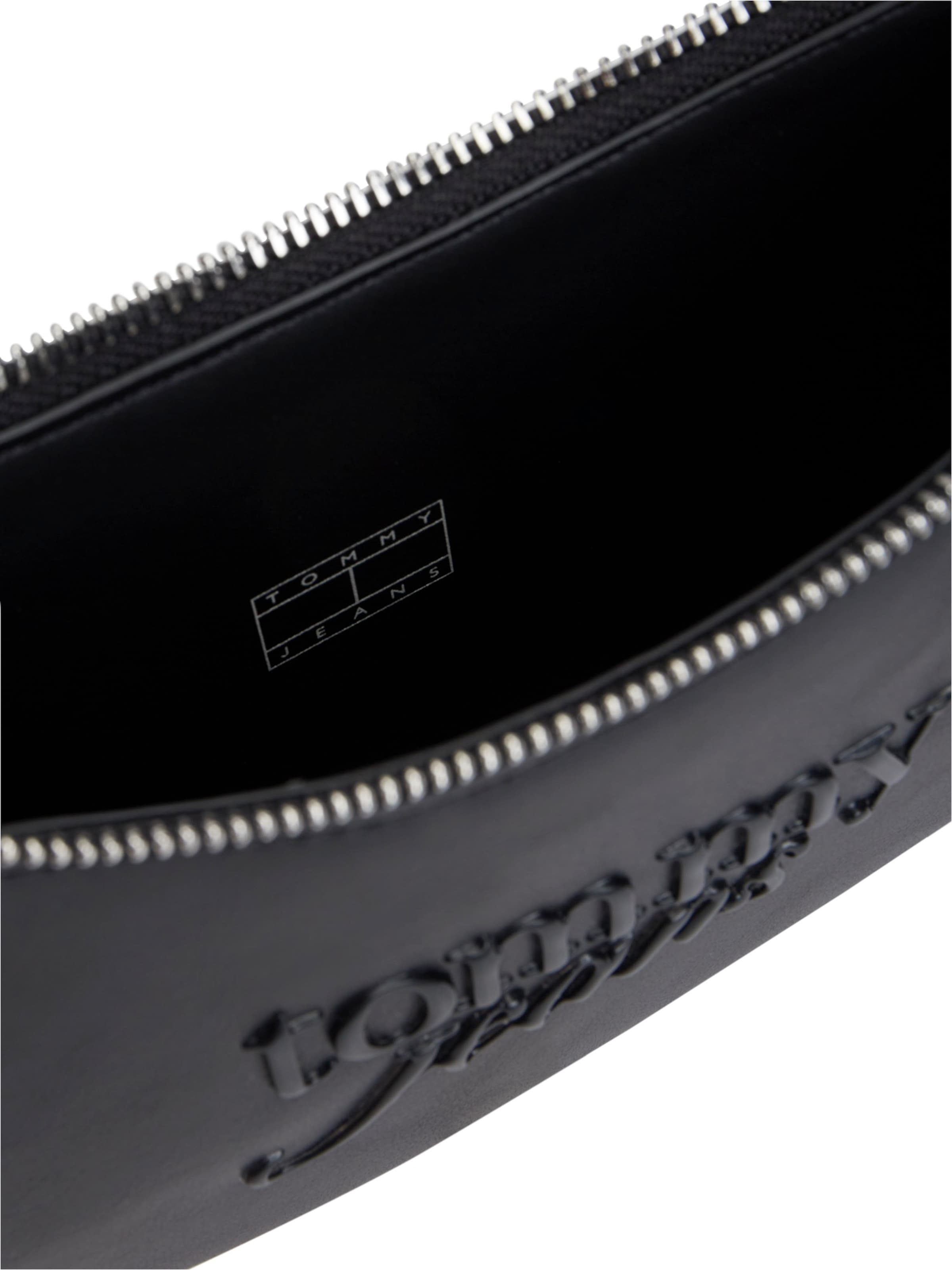 Tommy Jeans Olkalaukku 'MUST' värissä musta