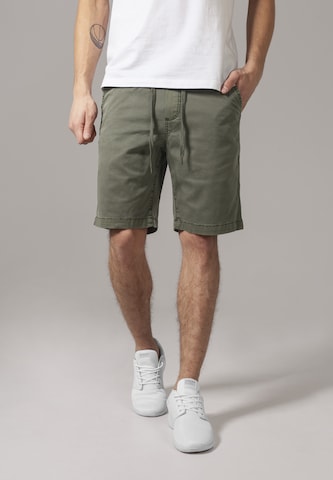 Urban Classics Regular Trousers in Green: front