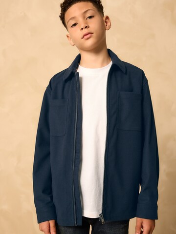 Next Jacke in Blau: Vorderseite