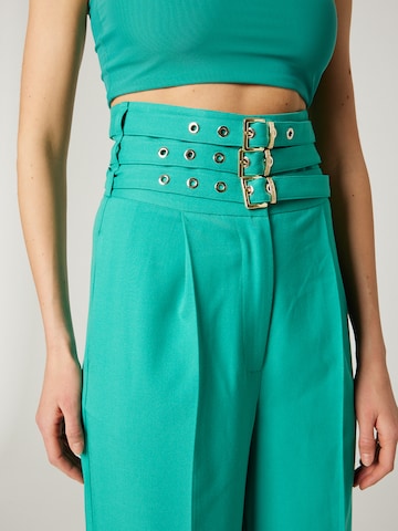 Hoermanseder x About You Wide leg Pleat-Front Pants 'Jill' in Green