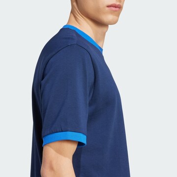 Maglietta di ADIDAS ORIGINALS in blu