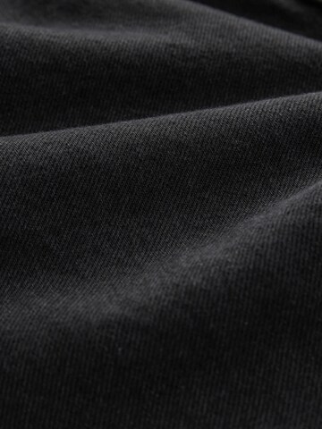 Tapered Jeans di Next in nero