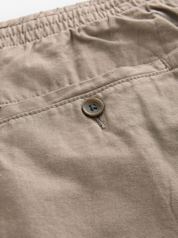 regular Pantaloni di Next in grigio