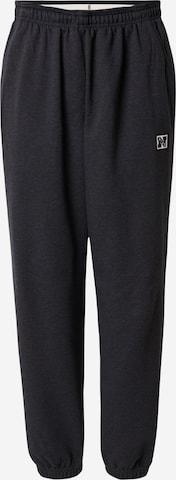 NIKE Alt kitsenev Spordipüksid 'HERITAGE', värv must: eest vaates