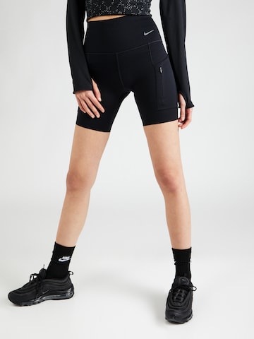 Skinny Pantaloni sport de la NIKE pe negru: față