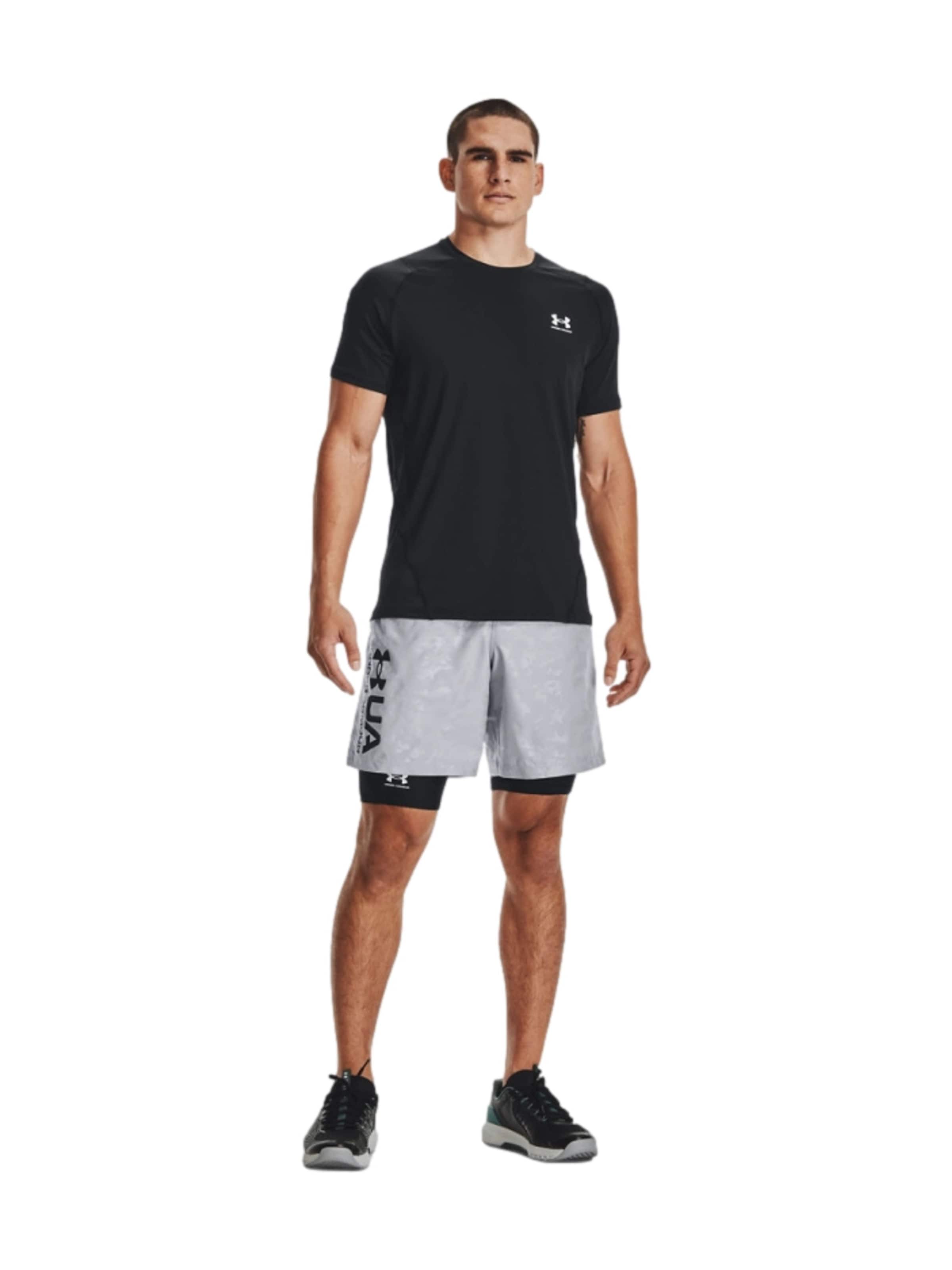 Skinny Pantaloni sportivi di UNDER ARMOUR in nero