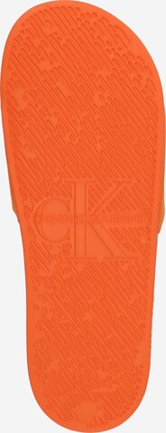 Calvin Klein Jeans Pantolette i orange