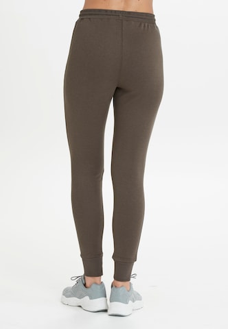 Athlecia Loose fit Workout Pants 'NIARY' in Green