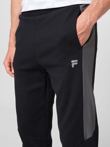 Effilé Pantalon de sport FILA en noir