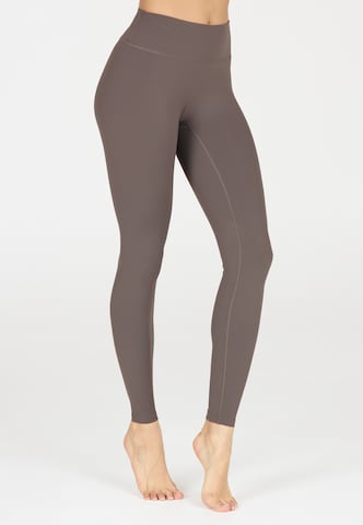 Athlecia Skinny Sportbroek 'Luxe' in Bruin