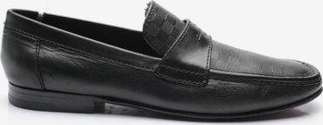 Louis Vuitton Flats & Loafers in 42 in Black: front