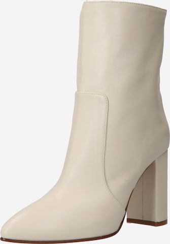 Toral Ankle Boots in White: front