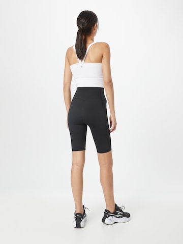 aim'n Slim fit Sports trousers in Black