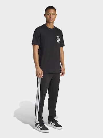 T-Shirt fonctionnel ADIDAS SPORTSWEAR en noir : devant