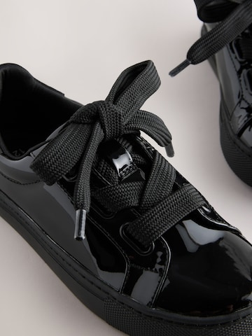Baskets Next en noir