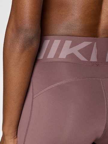 NIKE Skinny Παντελόνι φόρμας σε λιλά