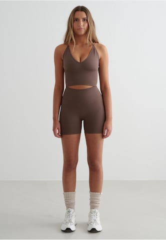 Skinny Pantaloni sportivi di Aim'n in marrone