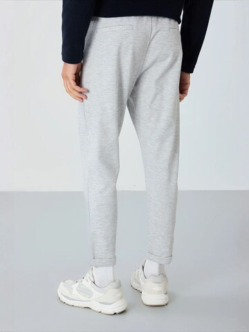 Tommy Life Zúžený Sportovní kalhoty 'Jogginghose' – šedá