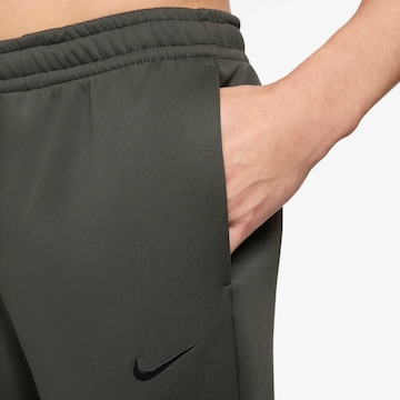 NIKE Regular Athletic Pants in Grey