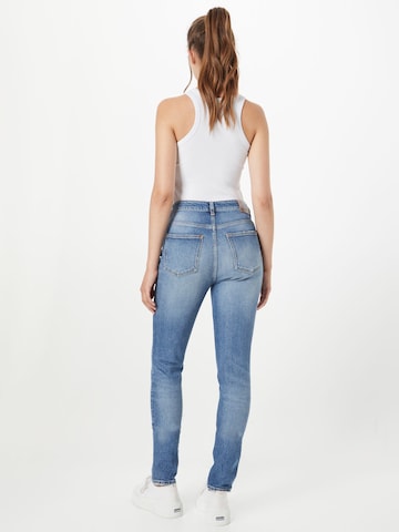 Slimfit Jeans 'The Line high rise skinny in organic cot' de la SCOTCH & SODA pe albastru