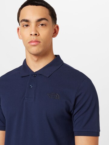 THE NORTH FACE Poloshirt in Blau