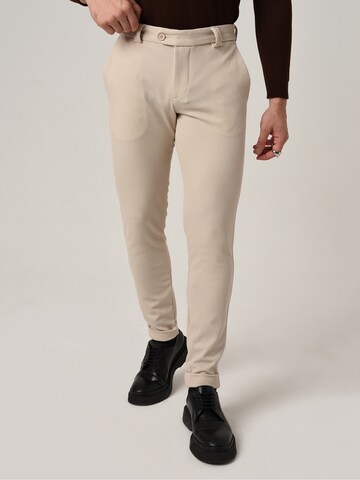 Antioch Skinny Trousers in Beige: front